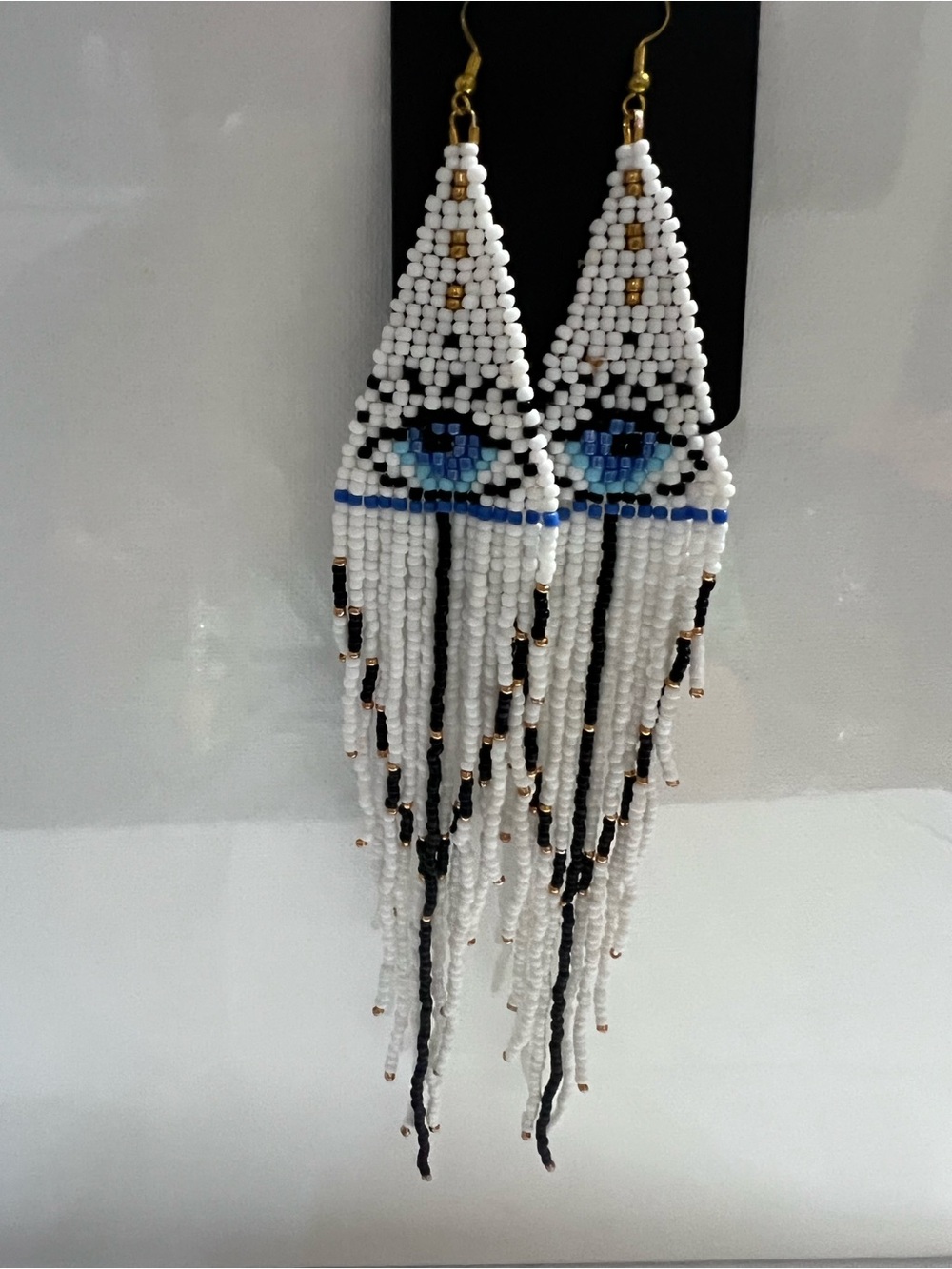 White and Blue Beaded Fringe Earrings with Eye Motif
